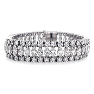 This bracelet features marquise and round brilliant cut diamonds th...