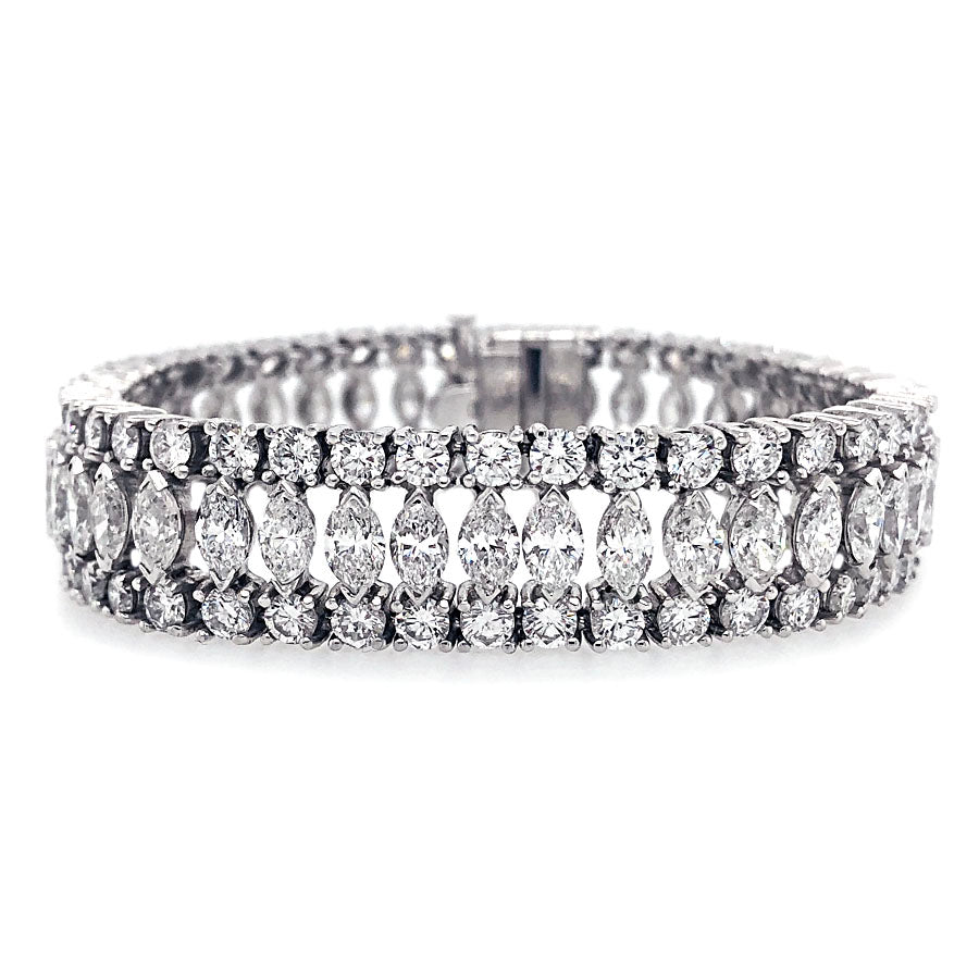 This bracelet features marquise and round brilliant cut diamonds th...