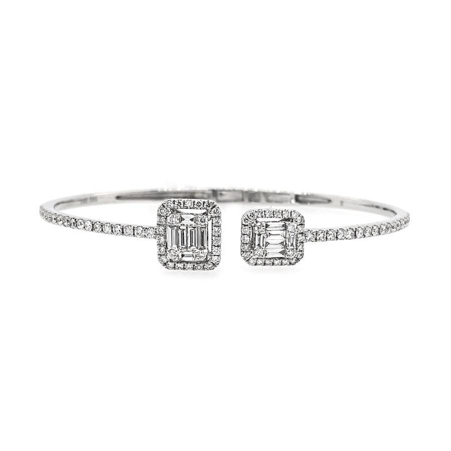This bracelet features baguette and round brilliant cut diamonds th...
