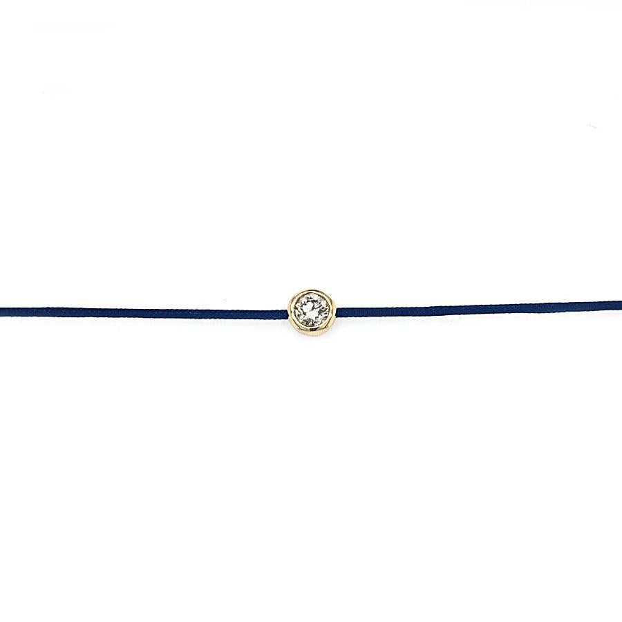 This bracelet features a bezel se round brilliant cut diamond that ...