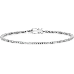 This tennis bracelet features round brilliant cut diamonds that tot...