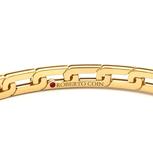 This chain-link style 18k yellow gold bangle is from the Navarra co...