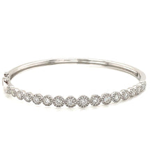 Add contrast to your arm party with this 14kt White Gold bangle! It...