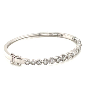 Add contrast to your arm party with this 14kt White Gold bangle! It...