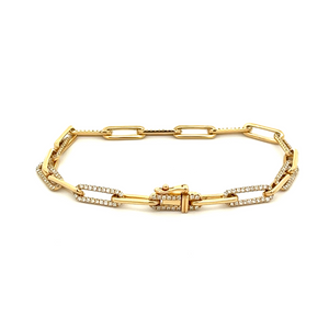 This 14k yellow gold bracelet features alternating paperclip links ...