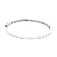 This easy to stack and style 14k white gold bangle features pave-se...