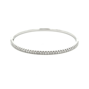This easy to stack and style 18k white gold bangle features pave-se...