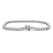 This beautiful 14k white gold diamond bracelet features 54 round br...