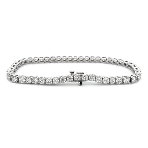 This beautiful 14k white gold diamond bracelet features 54 round br...