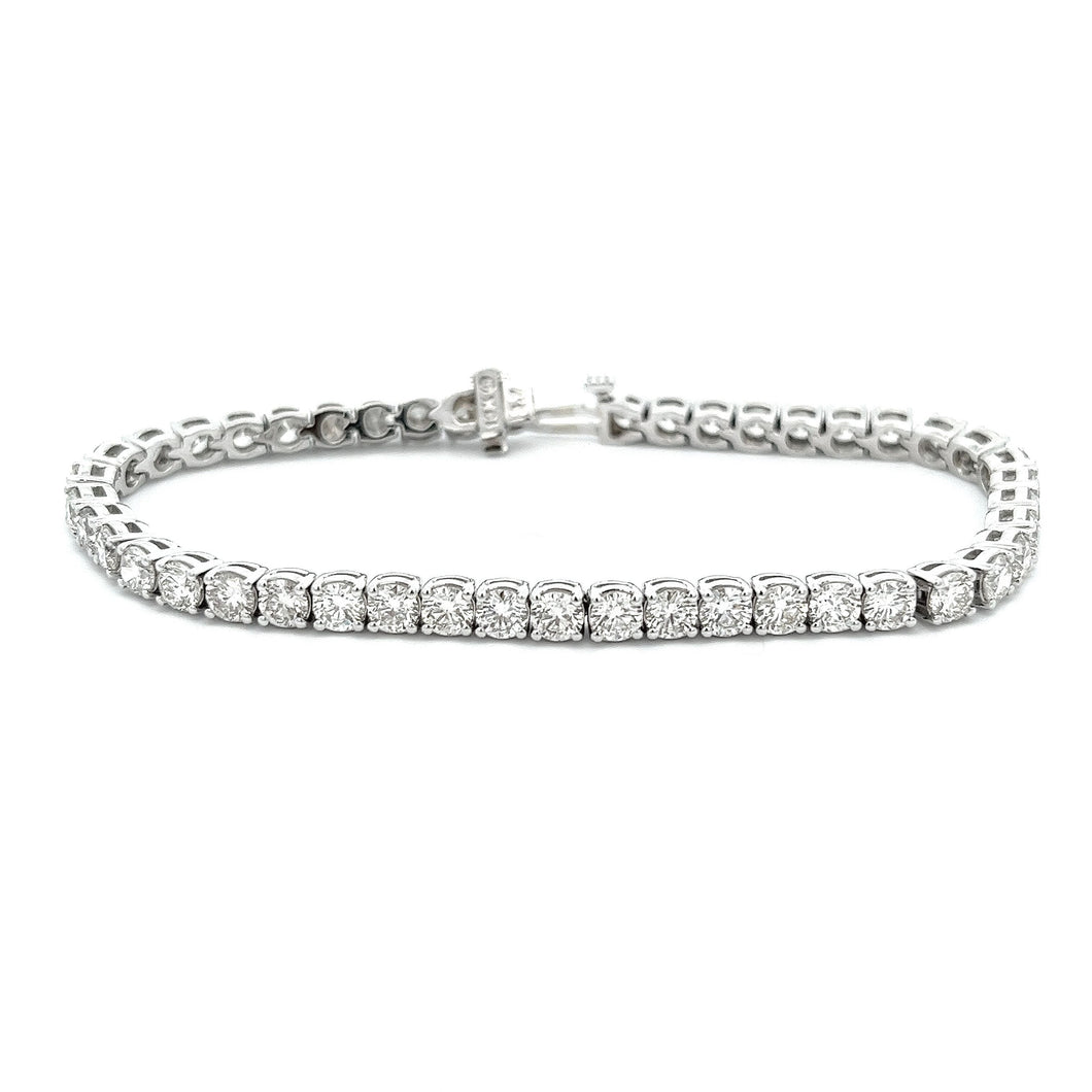 This beautiful 18k white gold diamond bracelet features 45 round br...