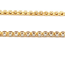 This easy to style bracelet features 72 bezel-set round brilliant c...