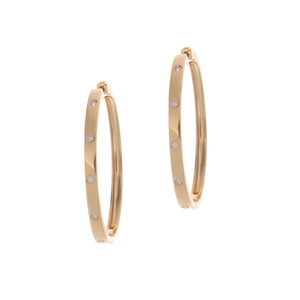 classic yellow gold hoops with diamonds totaling .19ct