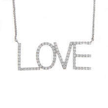 Featuring diamond letters spelling love, totaling .58cts