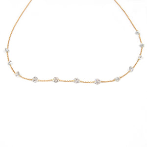 A modern and minimalist necklace featuring stunning diamonds totali...