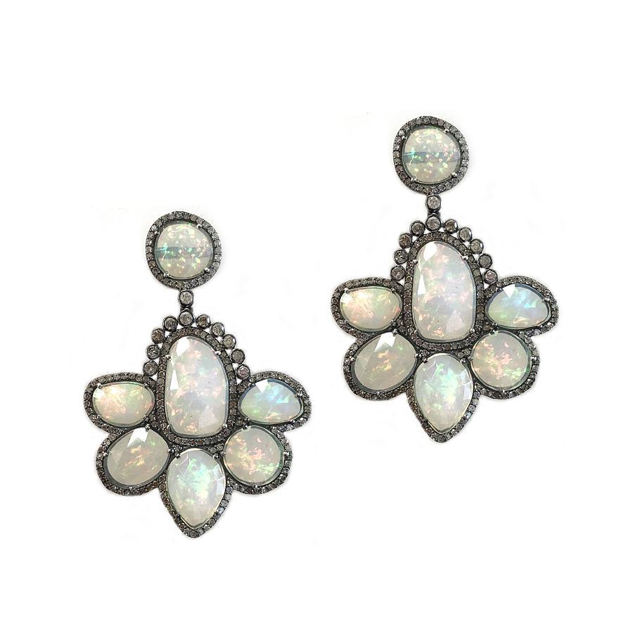 These earrings feature diamonds that total 2.64cts with multi shape...