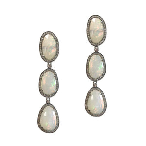 These earrings feature diamonds and opal set in black rhodium.