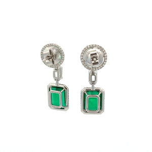 These gorgeous drop earrings feature 4 emeralds totaling approximat...