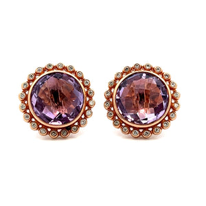 These unique 14k rose gold earrings feature amethysts that total ap...