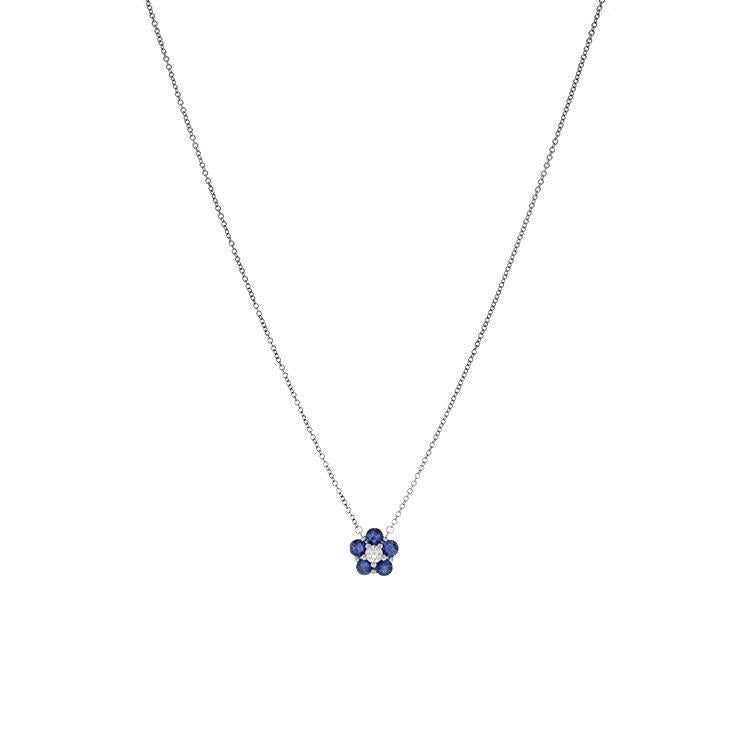 This necklace features a round brilliant cut diamond that totals .1...