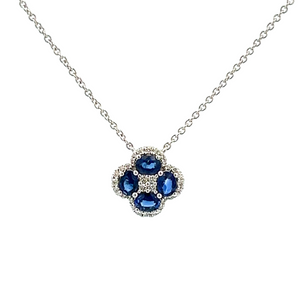 This 18k white gold necklace features 4 oval shape sapphires totali...