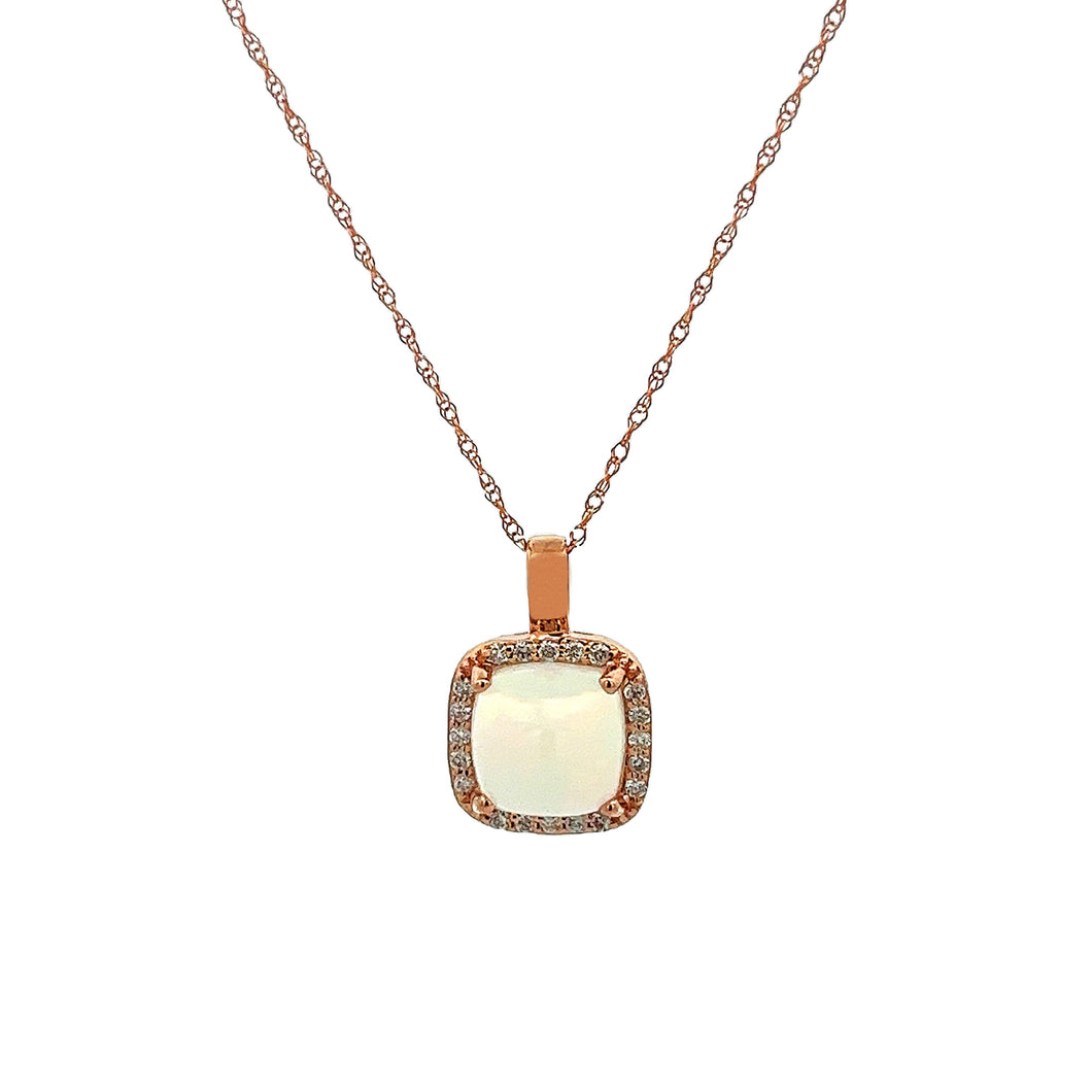 This 14k rose gold necklace features an opal that weighs approx. 1....