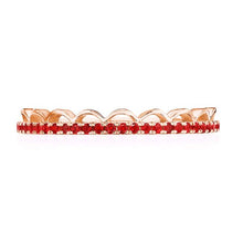 
Every queen deserves her crown. Yellow gold and vibrant red rubies...