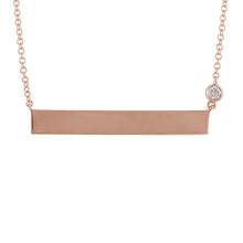 This necklace features an engraveable bar with a bezel set round br...