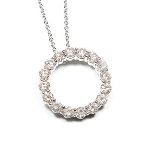 This pendant features gorgeous round brilliant cut diamonds totalin...