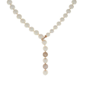 This adjustable lariat necklace features features 11-15mm south sea...