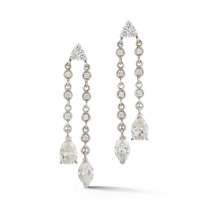 These estate earrings feature round, pear and marquise diamonds tha...