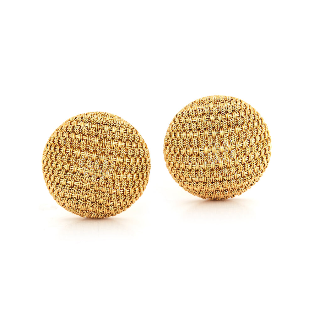 These estate earrings are in 18k yellow gold.