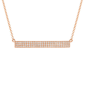This necklace features round brilliant cut diamonds that totals .26...