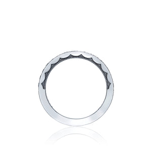 This beautiful ring has diamonds half way around or eternity with a...