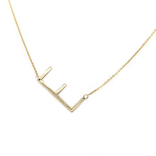 This necklace features a sideways E initial. 