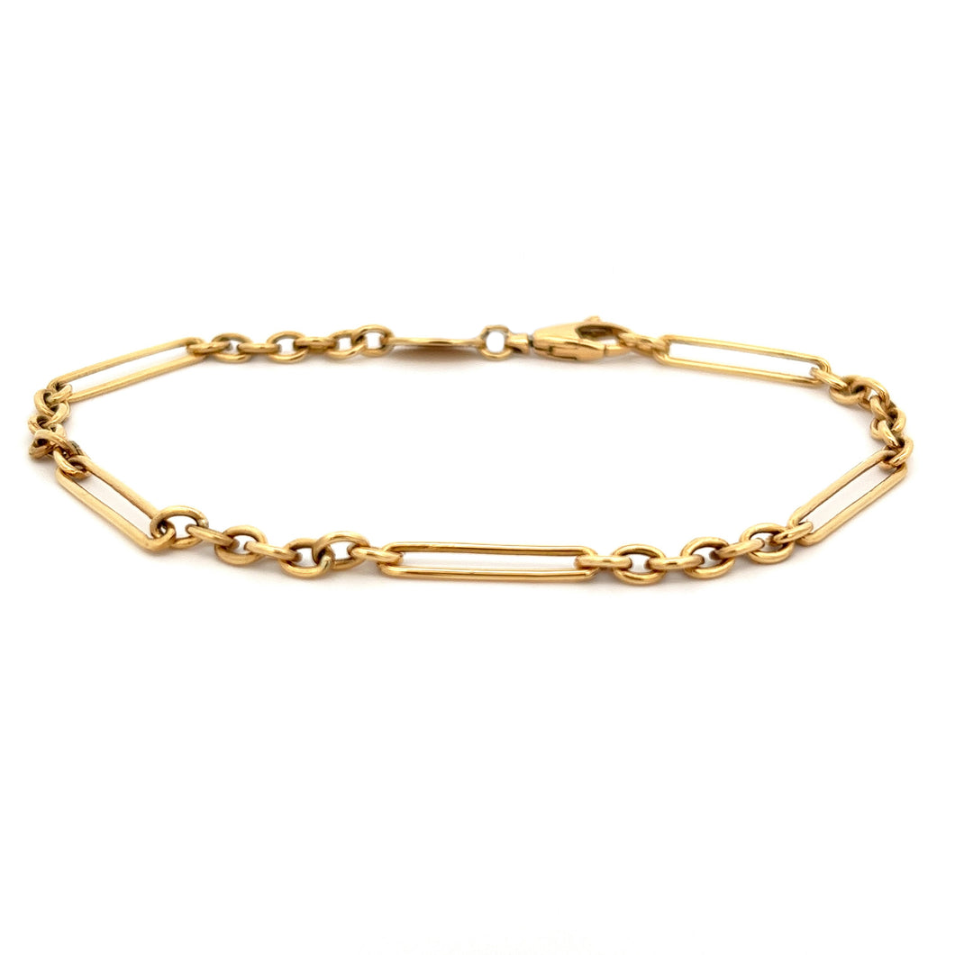 This 18k yellow gold link bracelet is the perfect way to accentuate...