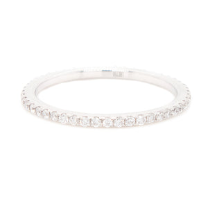 Minimalist eternity band with pave-set diamonds totaling .28ct