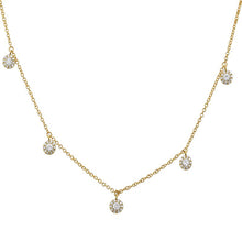 This diamond necklace features diamond cluster drops that total .37...