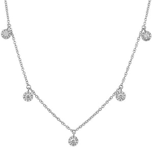 This diamond necklace features diamond cluster drops that total .37...