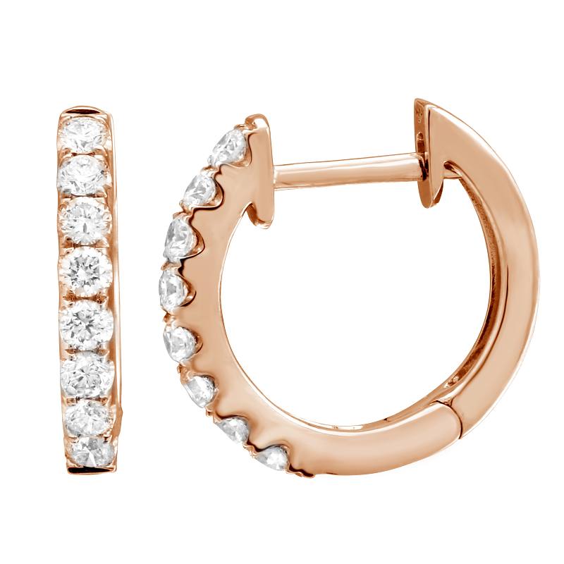These diamond huggy earrings features .18cts of round brilliant cut...