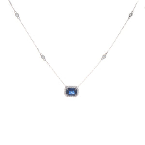 this necklace features diamond stations totaling .29ct and a sapphi...