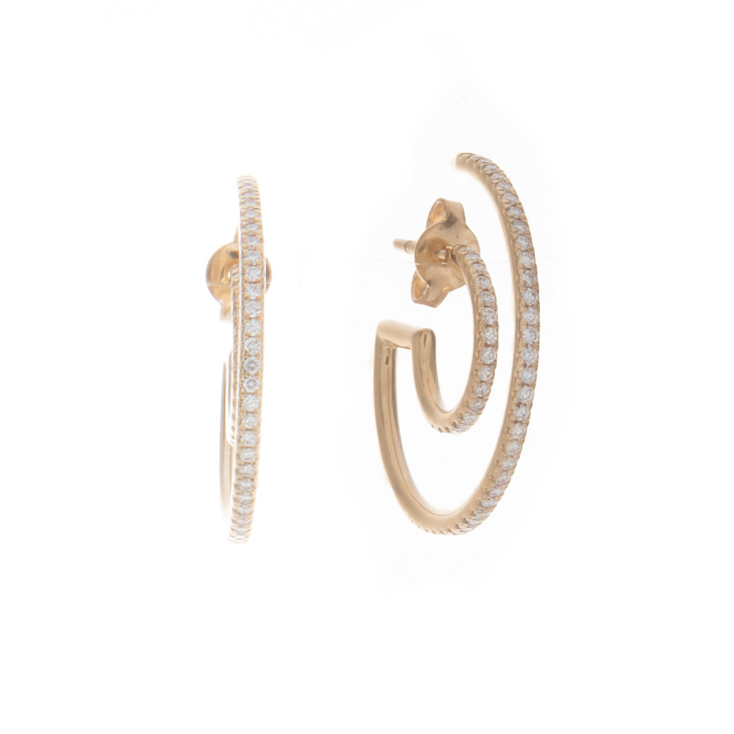 The modern style hoops feature diamonds totaling .55ct