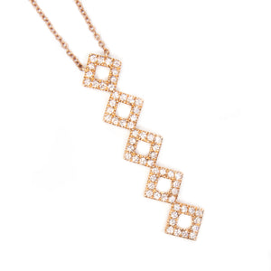This tiered necklace features a pendant with pave set round brillia...