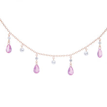 This rose gold necklace features pink sapphire pear shape drops tot...
