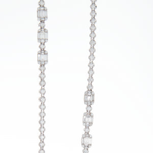 A stunning necklace featuring 60 baguette cut diamonds and 279 bril...