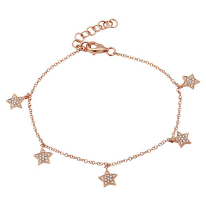 This bracelet features diamond star dangles with .15cts of round br...