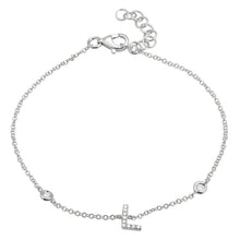 This bracelet features a diamond initial in the center. 6mm initial