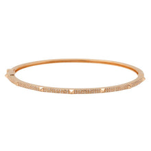 This diamond bangle features .36cts of round brilliant cut diamonds.