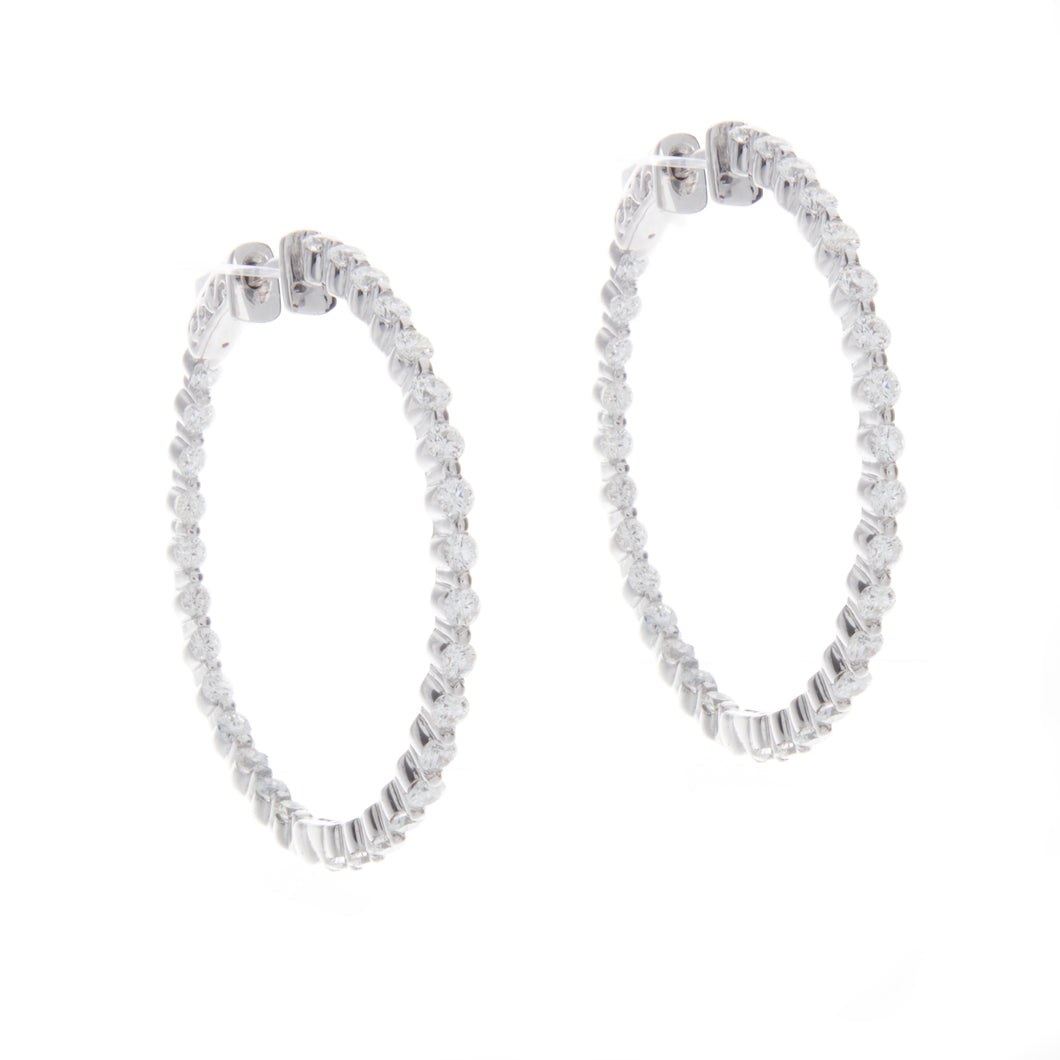 classic medium hoops featuring diamonds on the inside and outside t...