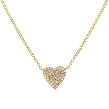This heart necklace features pave set round brilliant cut diamonds ...