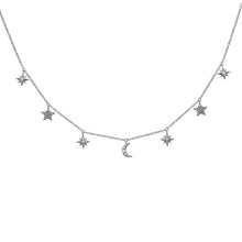 This necklace features pave set diamonds set in star and moon dangles.
